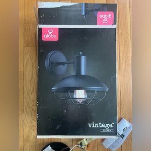 Oliver Matte Black Farmhouse Indoor/Outdoor 1-Light Wall Sconce with Caged Shade